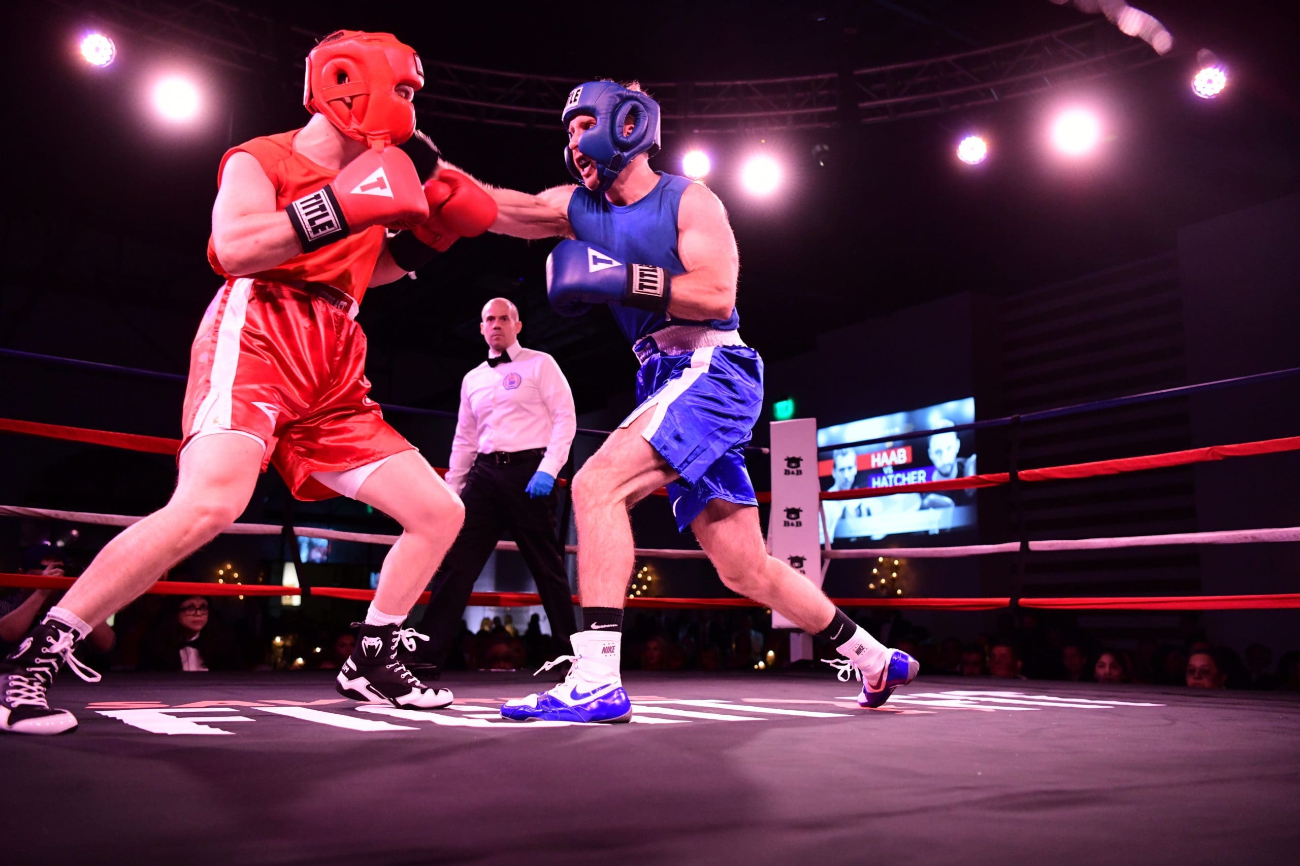 Well-placed punches between amateur boxers trained at Savarese Fit Fight. (Photo by Daniel Ortiz)