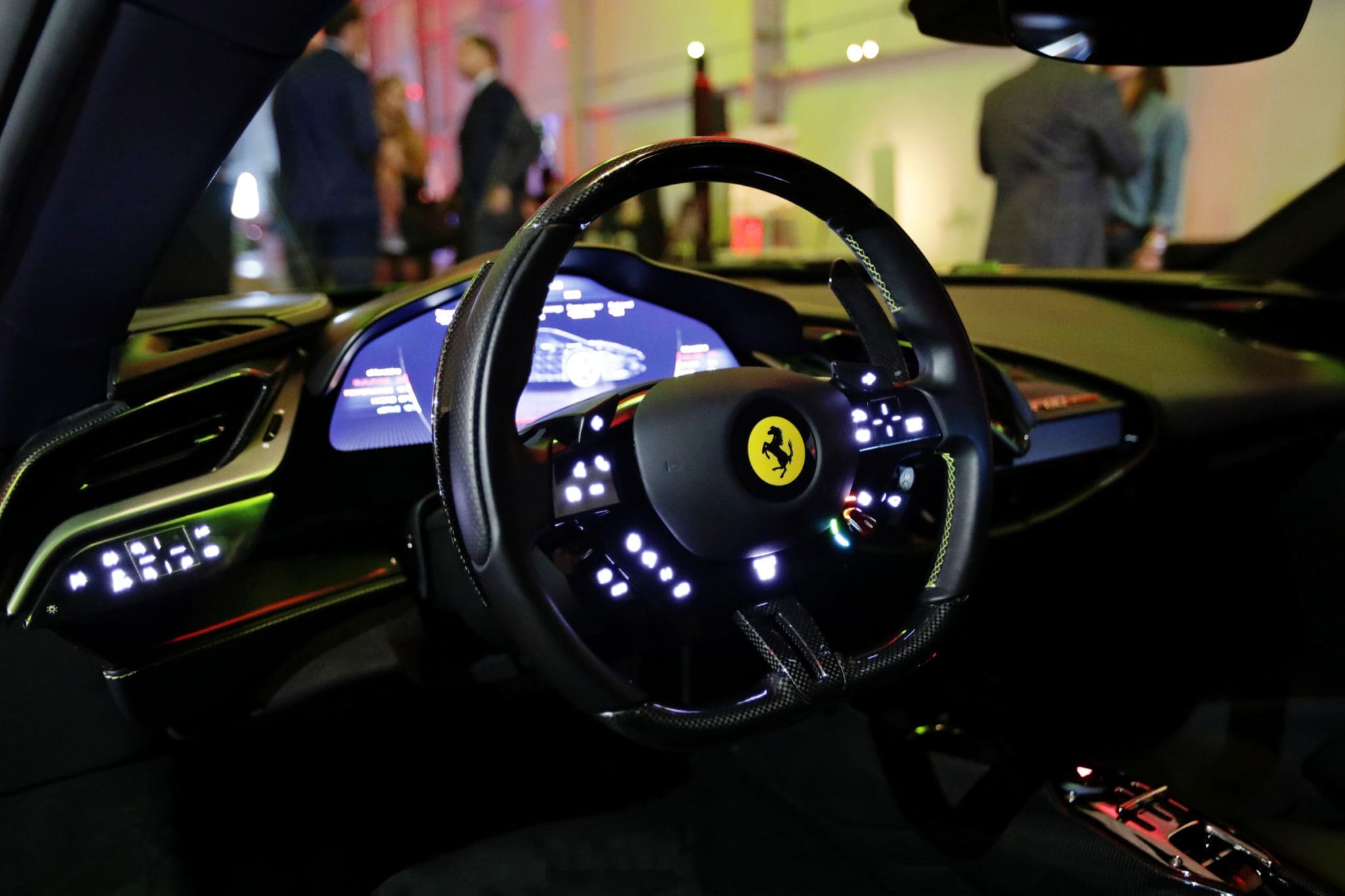 Th Ferrari SF90 Stradale interior features 3-D effect graphics.