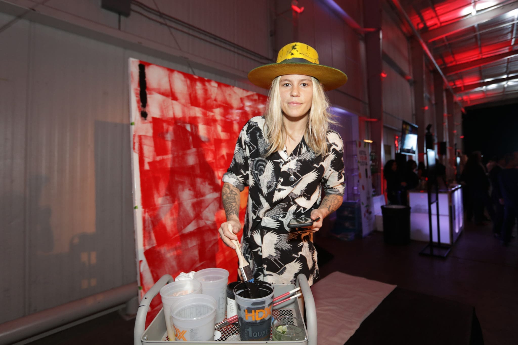 Artist Cara Barnhart painting with Ferrari inspiration