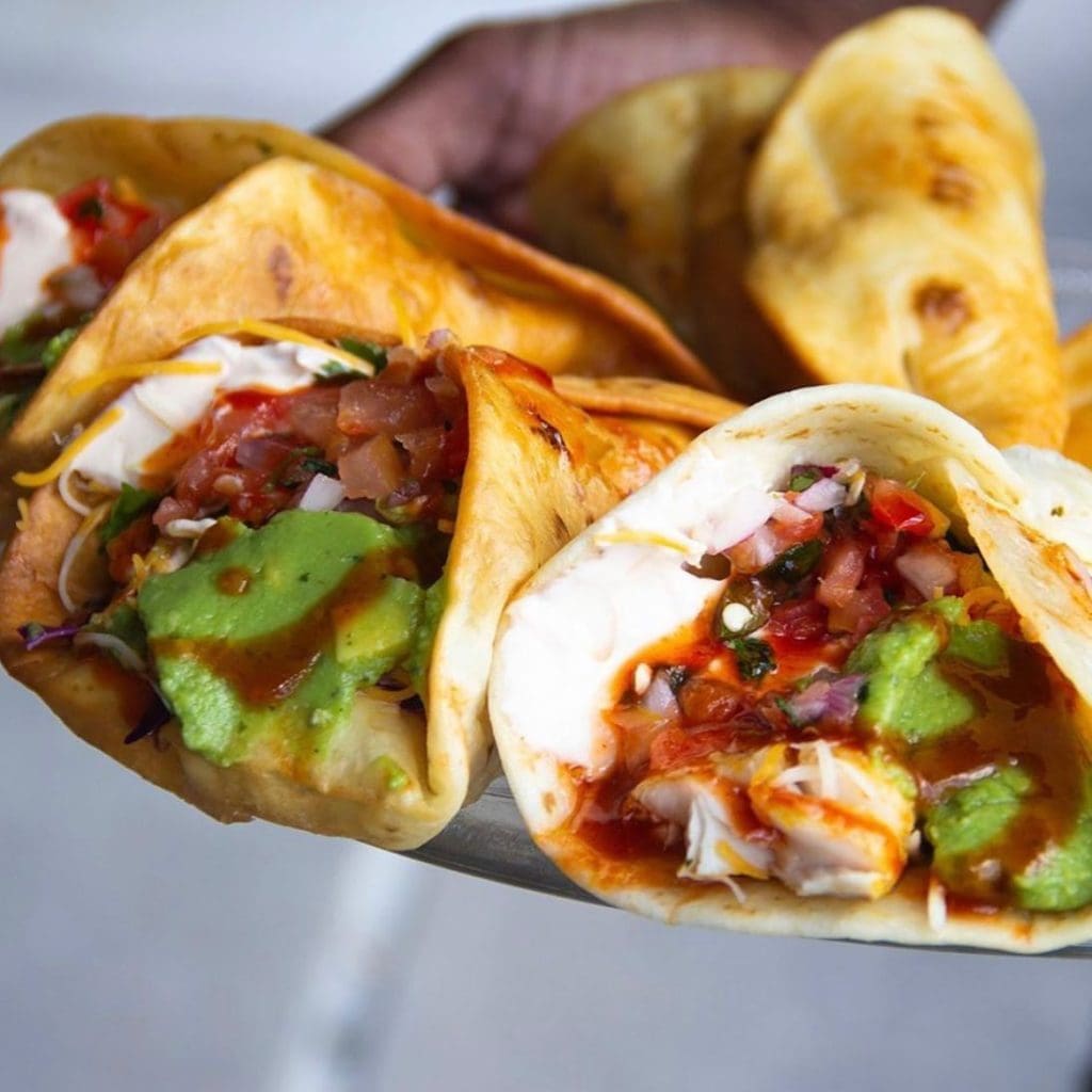 The tacos at Trill come with all kinds of savory sauces. 