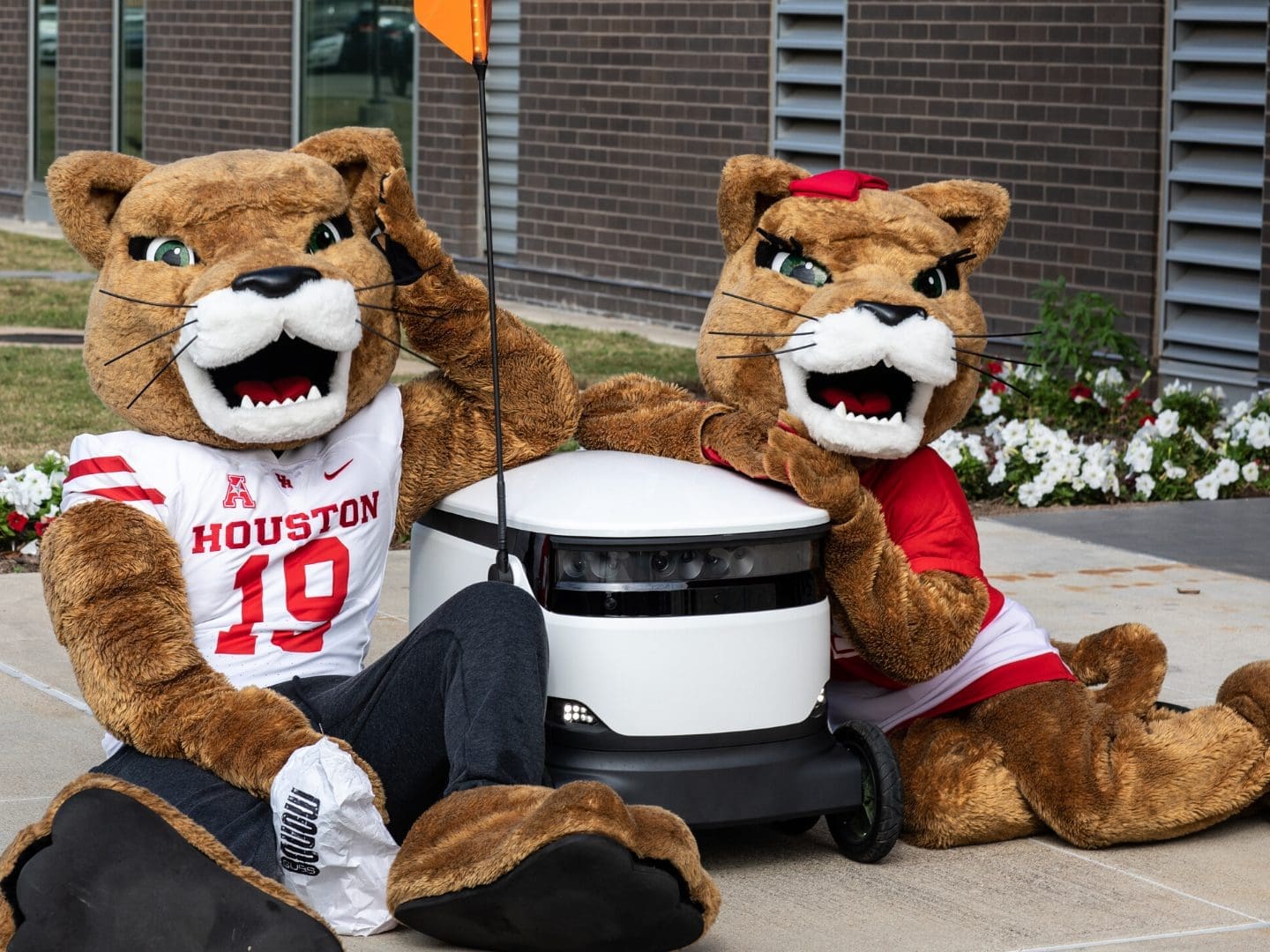 University of Houston's new food delivery robots are becoming as popular as the Cougar mascots.