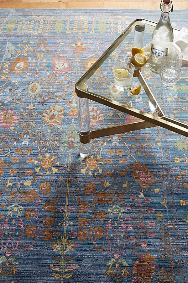 Rugs are a great way to work blue into a room.
Penhurst Rug in Wedgewood Blue - $998
Anthropologie.com