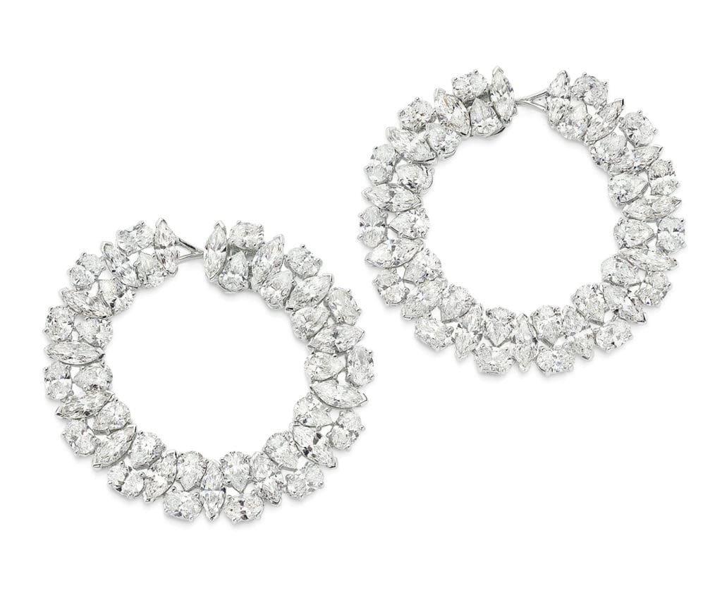 Diamond Hoop Earrings in 18K white gold with 22.93 carats of marquis, oval and pear cut diamonds. 