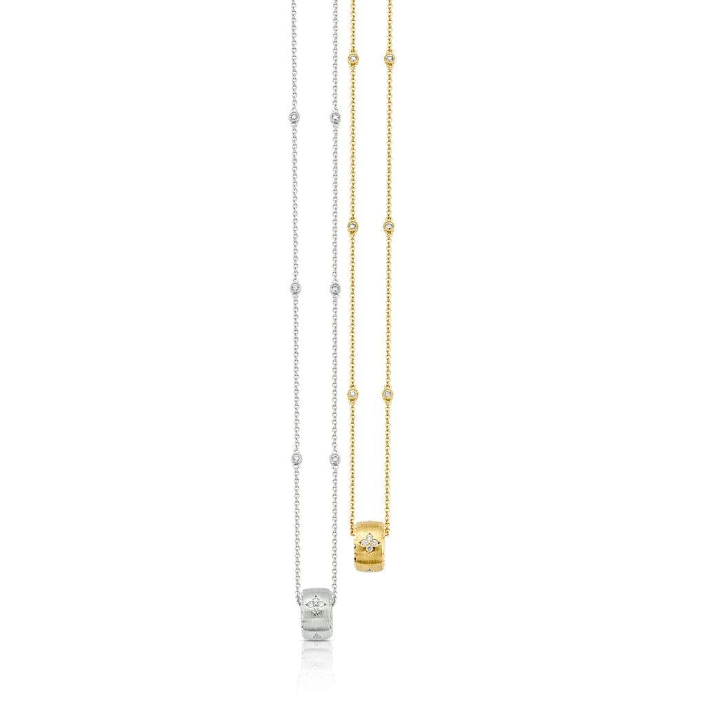 Étoile Pendants with diamonds in a star motif with satin finish and bead-set sides in 18K white or yellow gold.