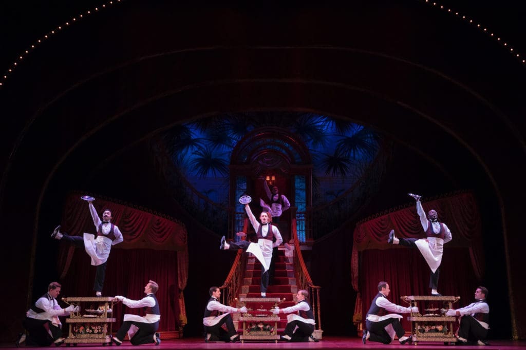The waiters dance for Dolly. (Photo by Julieta Cervantes)