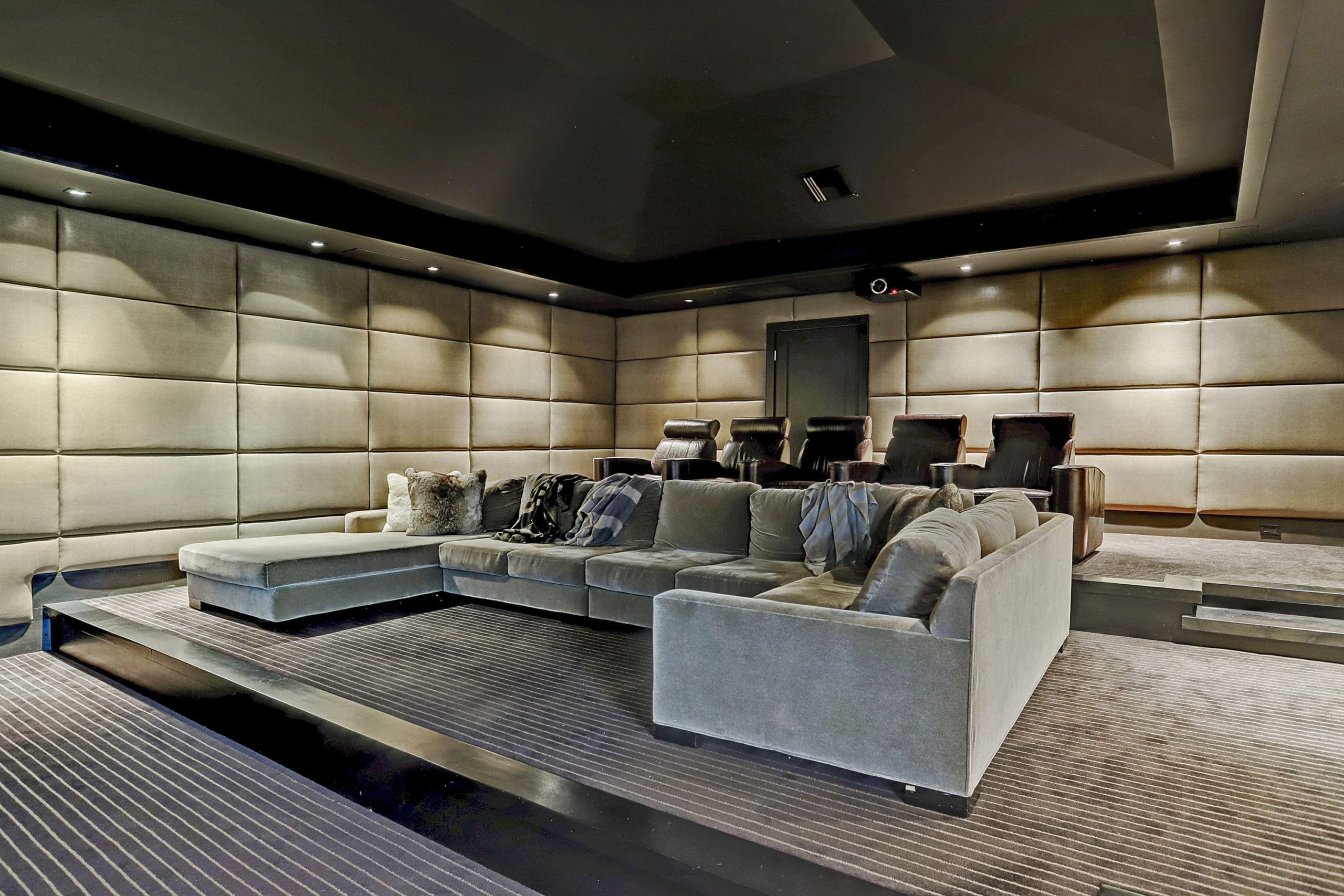 What would a mansion be without an in-home movie theater? (TK Images)
