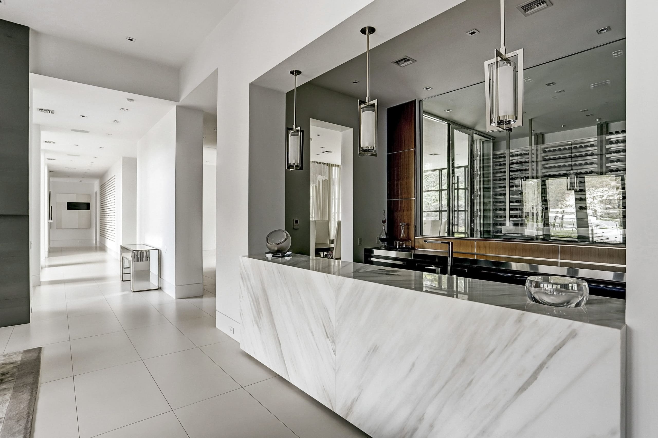 The 10-foot bar is carved from Carrera marble.