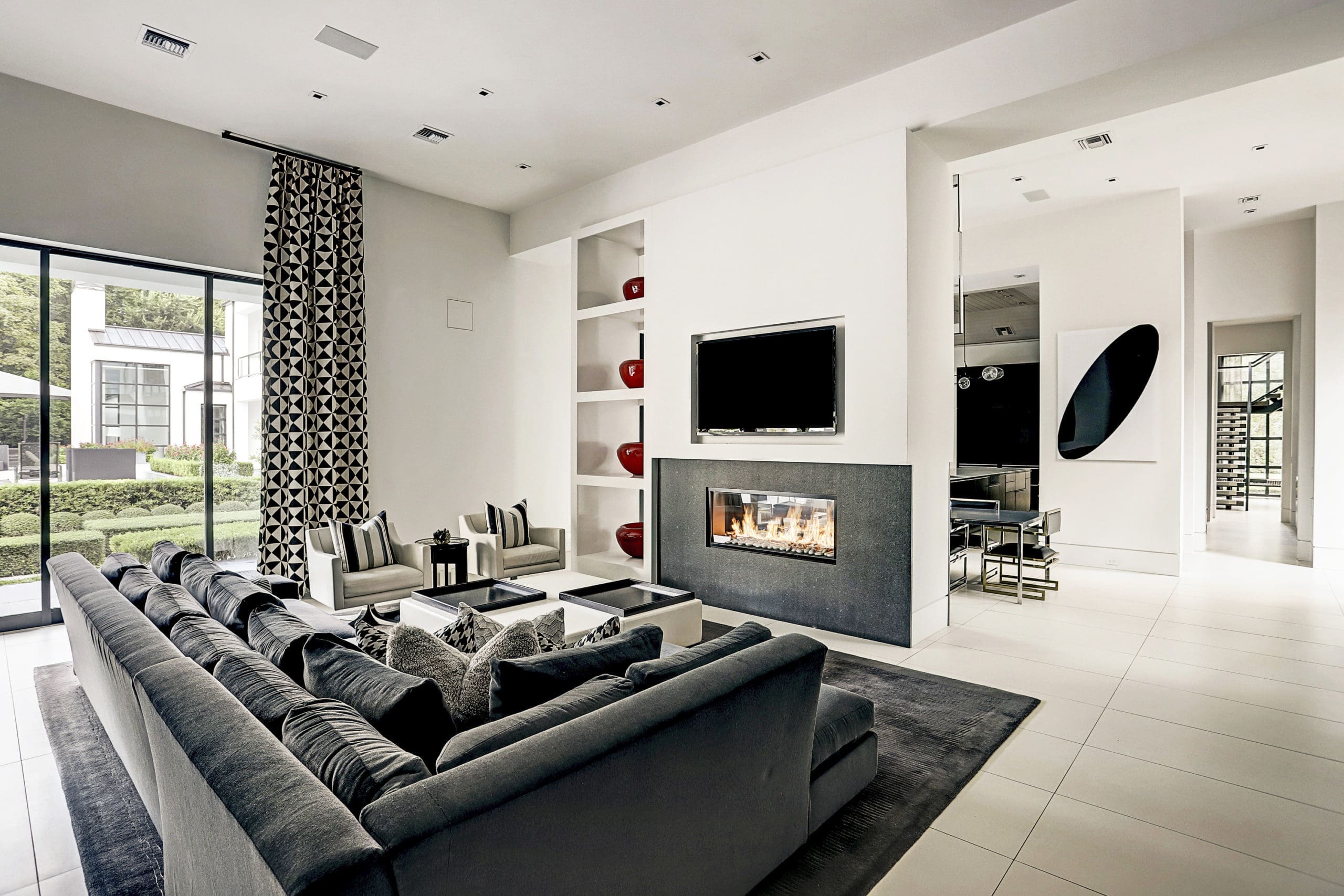  Behind the breakfast room, featuring the same double-sided Montigo fireplace is a second family room which opens up to the outdoor loggia through Fleetwood’s retractable in-wall door system. 
 (Photo by TK Images)