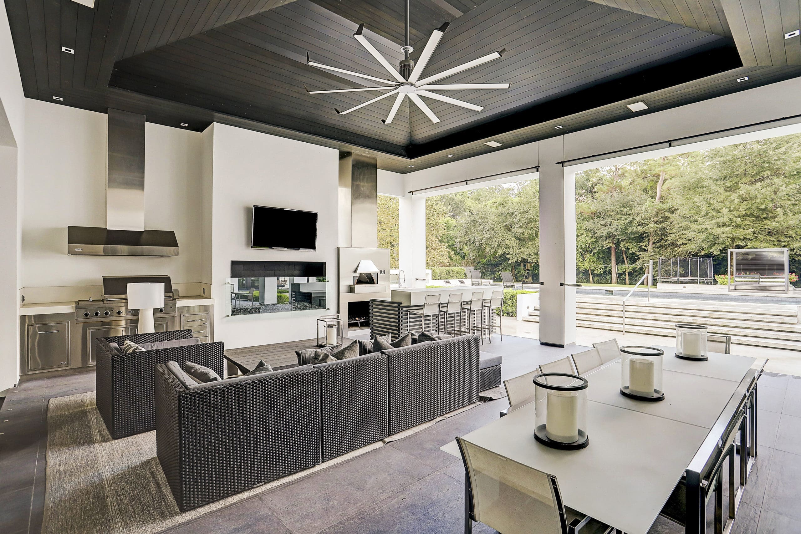 The covered loggia includes a fireplace, grill and wood-burning pizza oven. (Photo by TK Images)