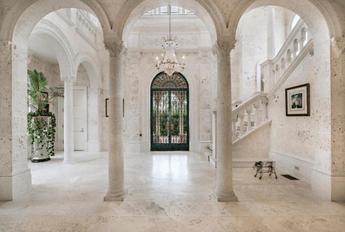 Roman style arcades are featured throughout the La Follia estate. (Photo by Giles Bradford, courtesy Douglas Elliman Real Estate)