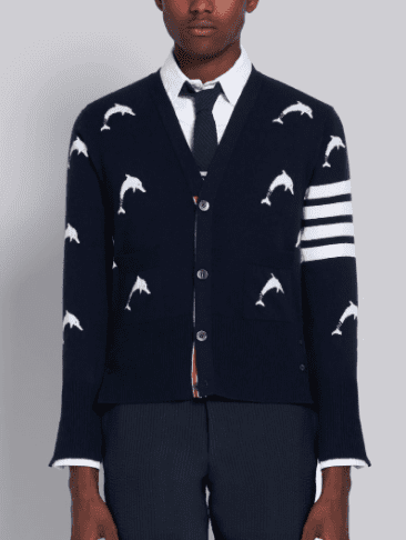 Thom Browne's navy cashmere dolphin intarsia v-neck 4-bar cardigan available at Thombrowne.com or select stores.