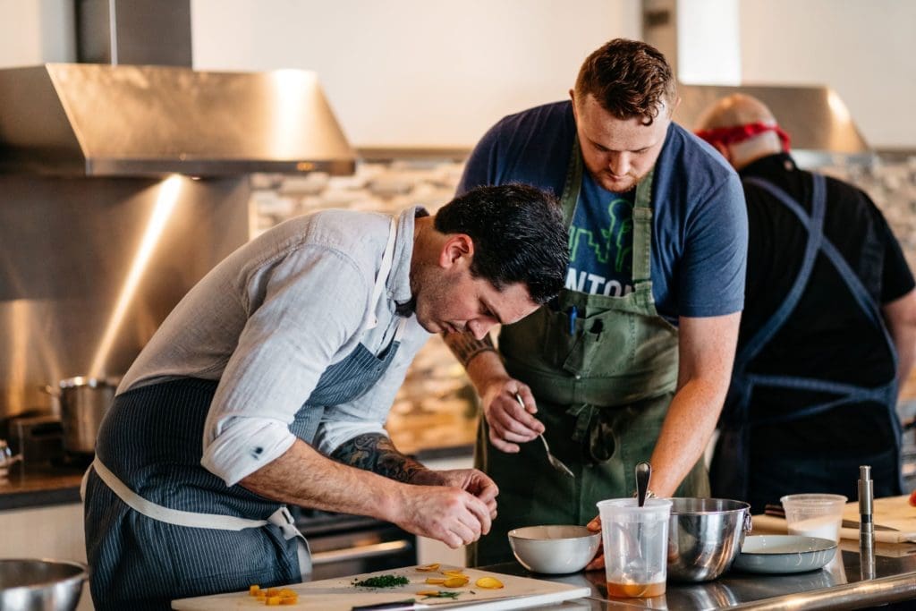 Chef Matt McCallister and Executive Chef Nick Walker finalizing the Commons Club menu.