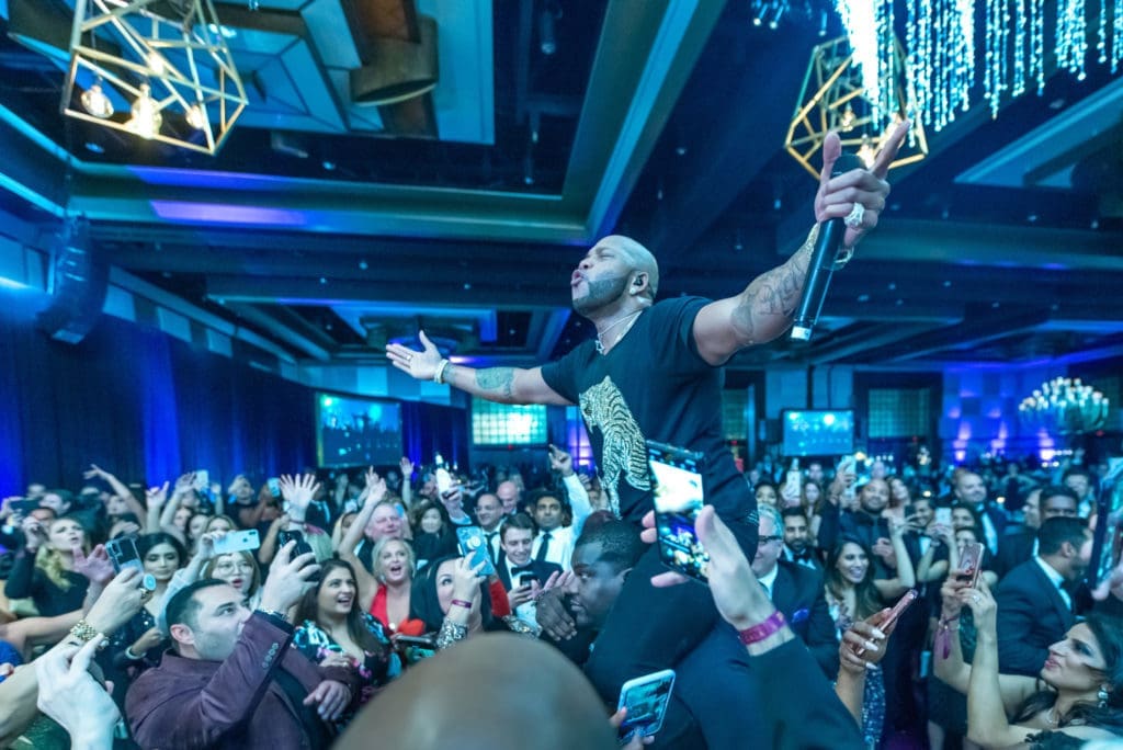 50 Cent, Flo Rida and More Mega Celebs Turn This Houston Night of Stars Into a $1.5 Million Affair