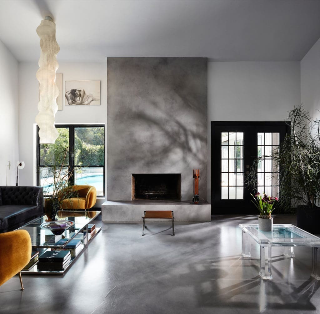 Rare vintage Knoll Barcelona stool with sling seat, and Danny Alessandro fireplace tools, circa 1970, from James McInroe. Lucite table, circa 1970, from White Elephant Antiques (now Benny Jack Antiques). (Photo by Lisa Petrole)