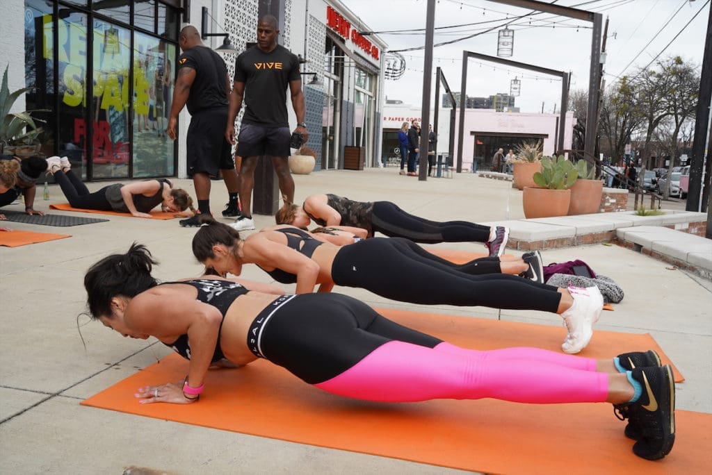 Vive Training led a vigorous workout outside of Jade + Clover on Deep Ellum's Main Street.  (Photo by Hannah Gibson)