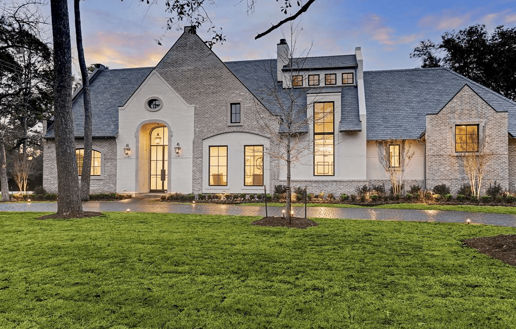 The home rising at 11614 Starwood Drive in Memorial enjoys the elegance of design by Marie and George Tracy and the construction expertise of Armo Custom Homes. (Photo by TK Images)