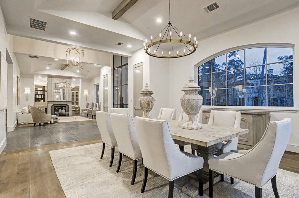 The open plan of the 7,832 square foot home invites large-scale entertaining. (Photo by TK Images)
