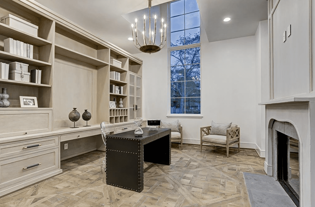 The study opens to the living room which opens to the foyer and dining room, an open floor plan without apologies. (Photo by TK Images)