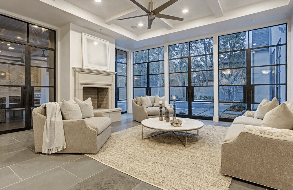 The family room overlooks the swimming pool. (Photo by TK Images)