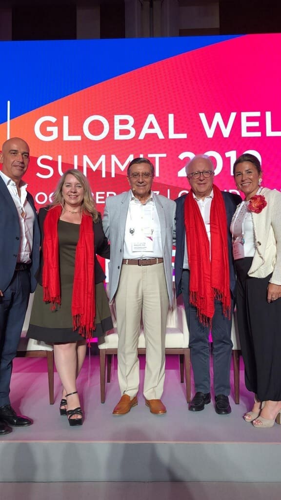 Mental wellness experts and influencers at the Global Wellness Summit, Singapore, 2019. From left: Chicco Tatriele, Dr. Cassandra Vieten, Dr. Gerard Bodeker, Dr. Sergio Pecorelli, and Alina Hernandez (representing Dr. Renee Moorefield). (Courtesy the author)