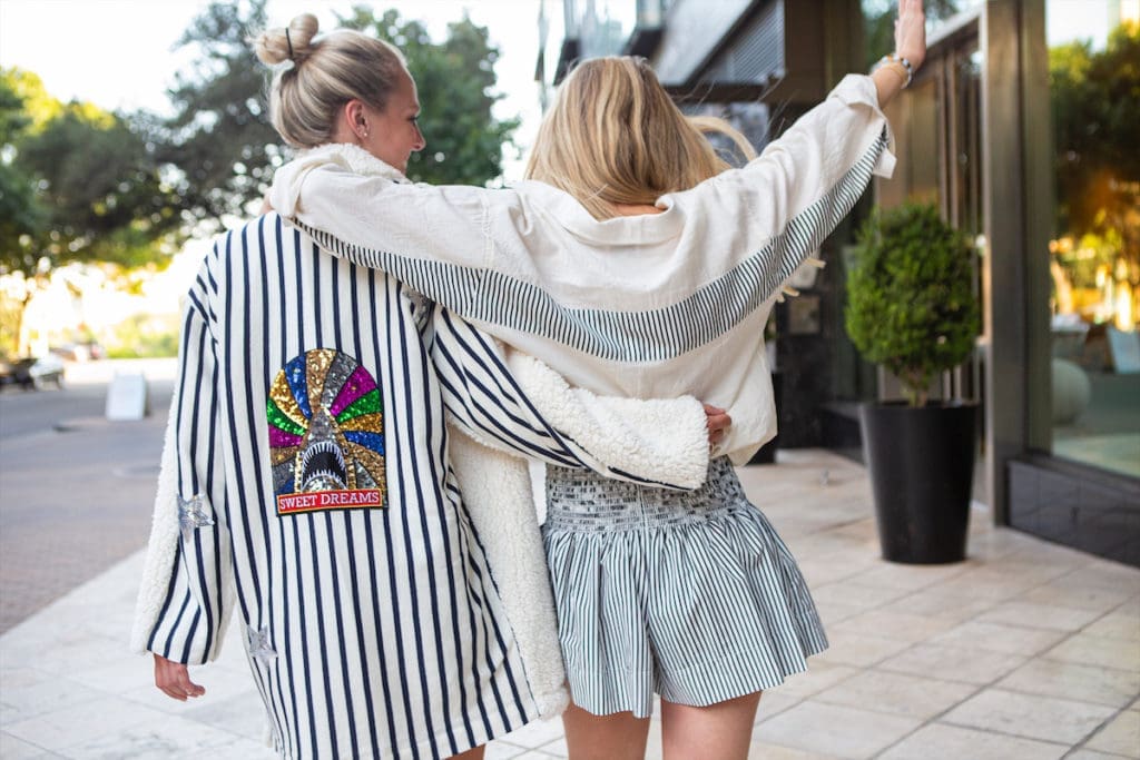 Designer Nicole Musselman's Koch just launched a spring break capsule collection, filled with parrot prints, citrus hues, and a very important yellow skirt situation. (Photo by courtesy of Koch )