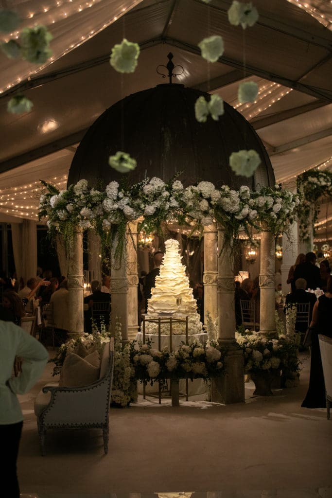 The wedding cake gets the spotlight in the Schlegel's gazebo. (Photo by John Cain)