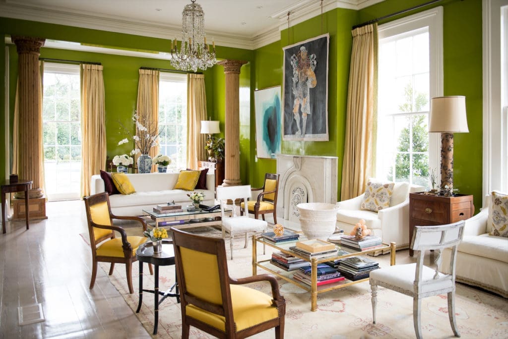 Jane Scott Hodges' home in New Orleans: In the parlor, walls triple lacquered in custom chartreuse by Fine Paints of Europe. (Photo by Paul Costello)
