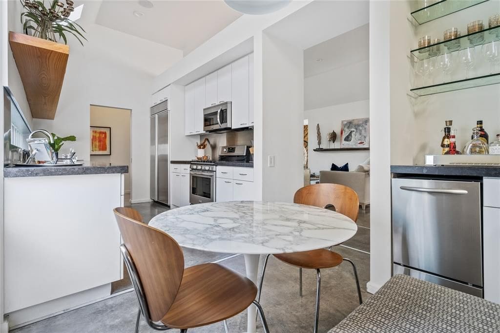 Kitchen views from the cozy breakfast nook. (Photo by Briggs Freeman Sotheby's)