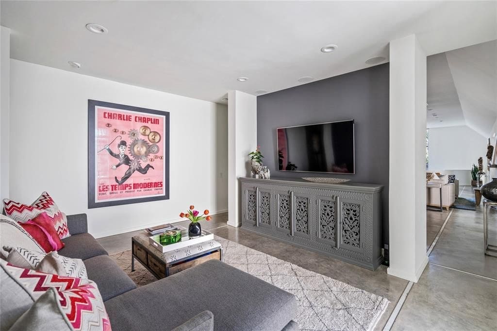 Custom concrete floors are found throughout the majority of the Ron Wommack-designed home. (Photo by Briggs Freeman Sotheby's)