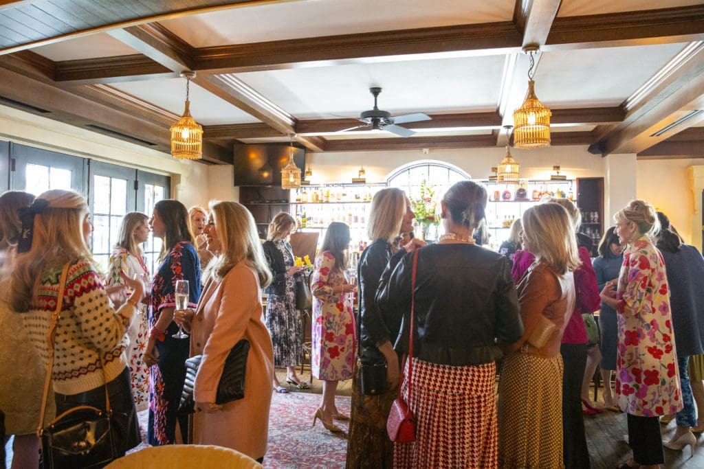 A colorful crew upstairs at Le Colonial for the Frances Valentine luncheon. (Photo by Jenny Antill Clifton)