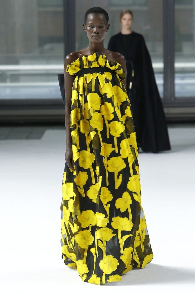 Carolina Herrera goldenrod yellow and black fil coupe strapless ruffle gown, dark green pumps.(Photo courtesy of Carolina Herrera)