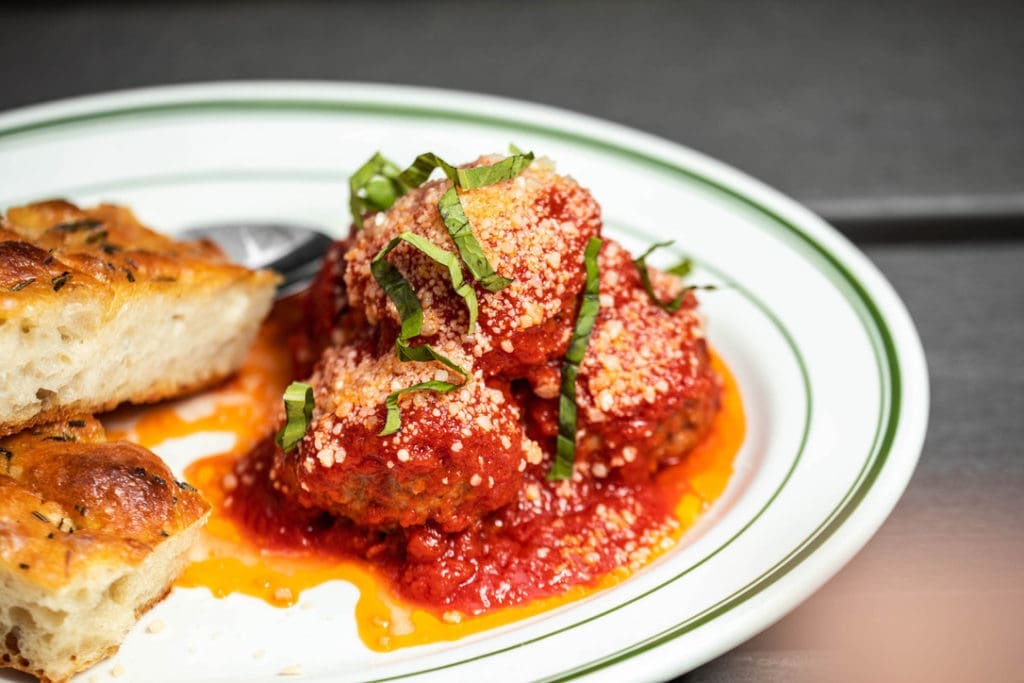 The meatballs at il Bracco are a mixture of beef, lamb and pork and topped with house tomato sauce and 24-month aged parmesan reggiano.