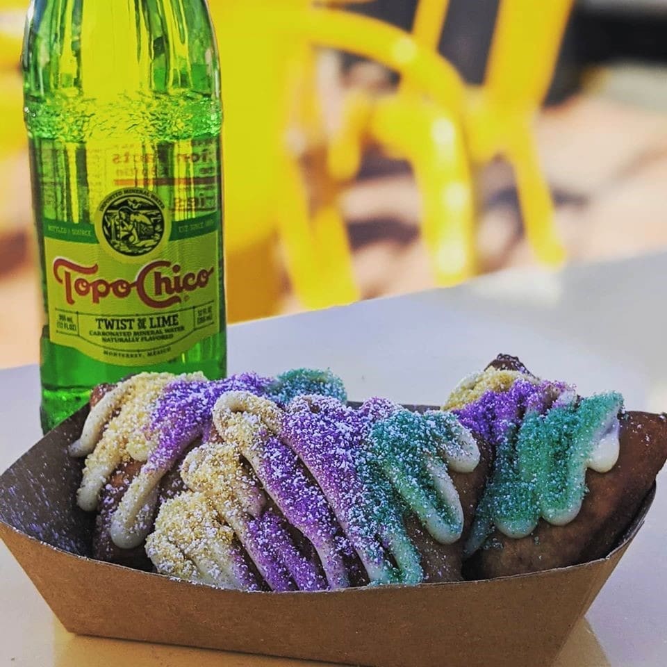 Get them while you can - seasonal King Cake beignets from The Dusty Biscuit Beignet Bar.