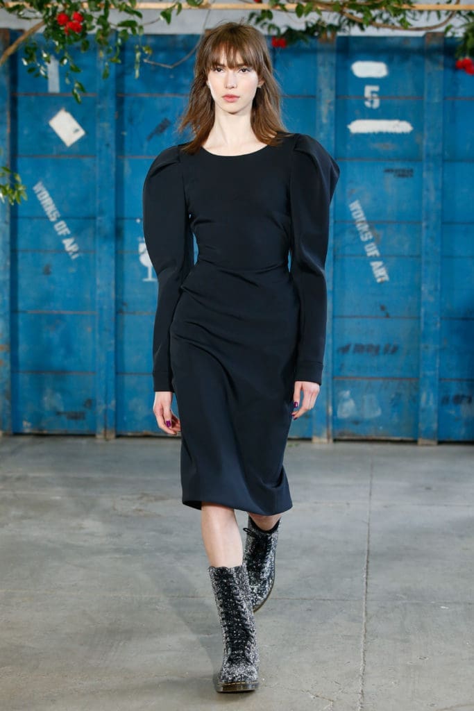 Jonathan Cohen black dress made from Econyl nylon yarn and Dr. Marten combat boots decorated with upcycled Swarovski crystals. (Photo by Dan Lecca)