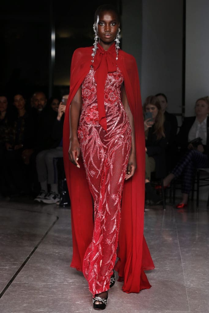 Naeem Khan red sheer beaded gown and cape. (Photo by Dan and Corina Lecca)