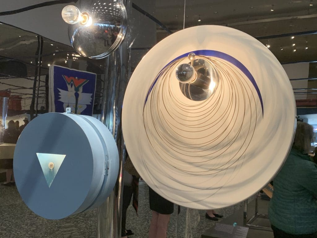 Fulvio Ferrari's "Ameba" Lamp, Bruno Contenotte's "Light Object" and Gaetano Missaglia's "Spazio" Lamp illuminate the journey into wonderland. (Photo by Tarra Gaines)