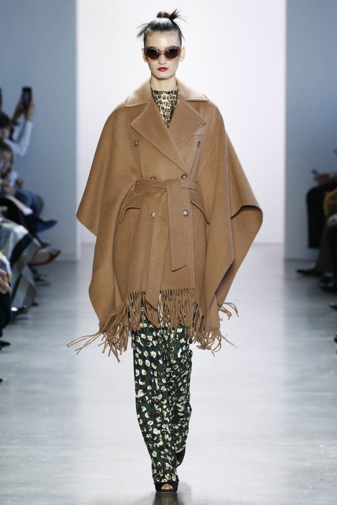 Badgley Mischka camel poncho, floral slacks. (Photo courtesy of Badgley Mischka)