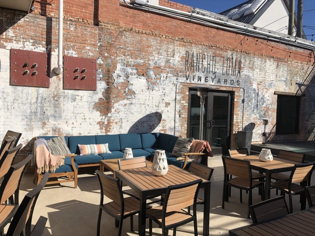 Lounge seating in the secluded courtyard. (Photo by Courtney Dabney).
