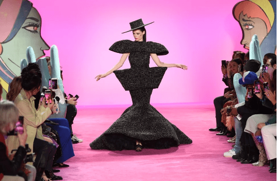 Model Coco Rocha closed the Christian Siriano runway show in an unusual metallic sculpted gown. (Photo by Dia Dipasupil/Getty Images for NYFW: The Shows)
