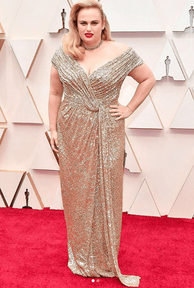 Actress Rebel Wilson garnered rave fashion reviews at her first Oscars in a custom designed gold sequined gown by Jason Wu. (Instagram: @jasonwu)