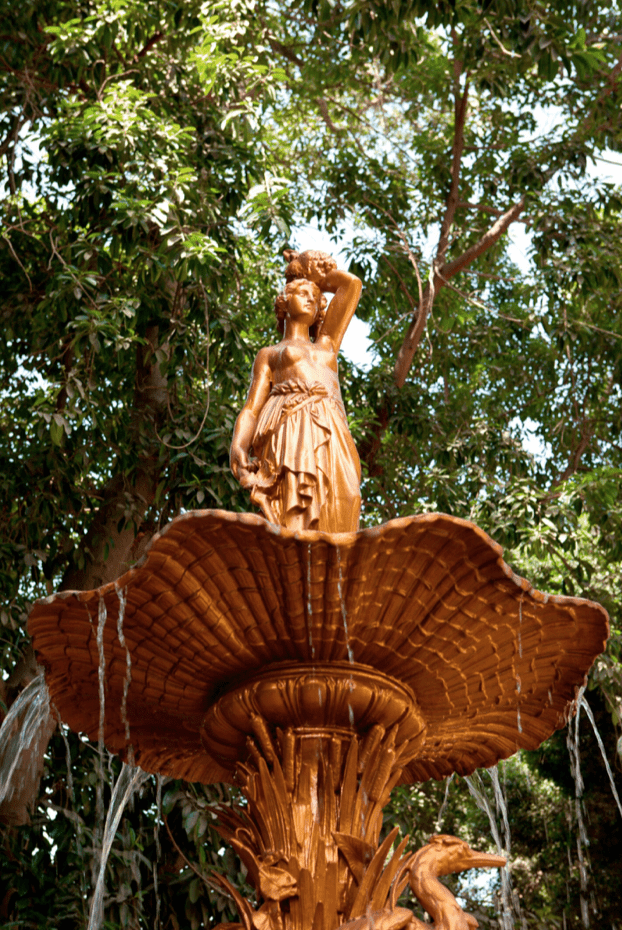 The gardens of the Cairo Marriott are lush with greenery and statuary.