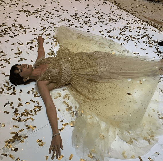 Houston Ballet Ball chair Beth Zdeblick makes a confetti angel on the floor of Wortham Theater Center after the ball. And that's a wrap. (Instagram photo)  