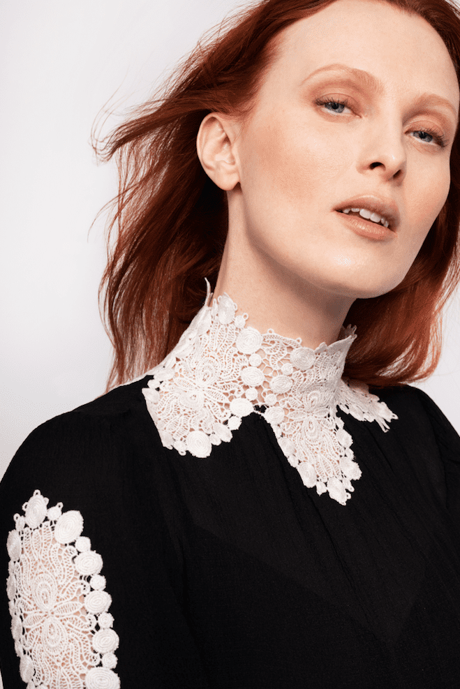 Model Karen Elson in a Kate Spade Victorian-inspired blouse with lace detail at collar and arms. (Photo by Andres Burgos )