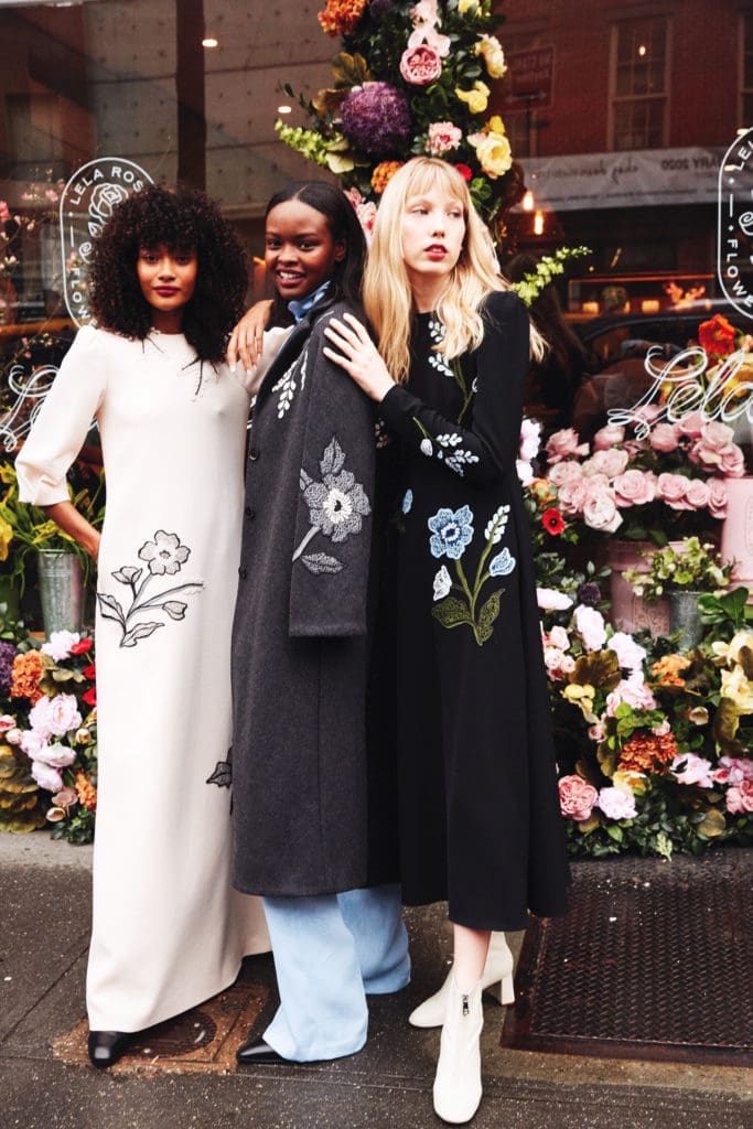 From left, Lela Rose charcoal floral embroidered coat, delphinium silk satin draped blouse, delphinium embossed trouser; camellia wool crepe floral embroidered floor-length sheath; black crepe floral embroidreed dress. (Photo by Taylor Jewell)
