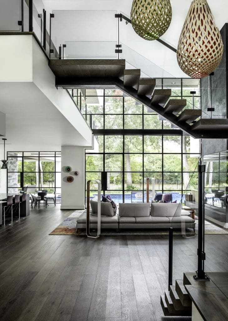 Stepping in through the front door, the visitor takes in the expanse of the contemporary home where art plays a significant role. (Photo by Kerry Kirk)