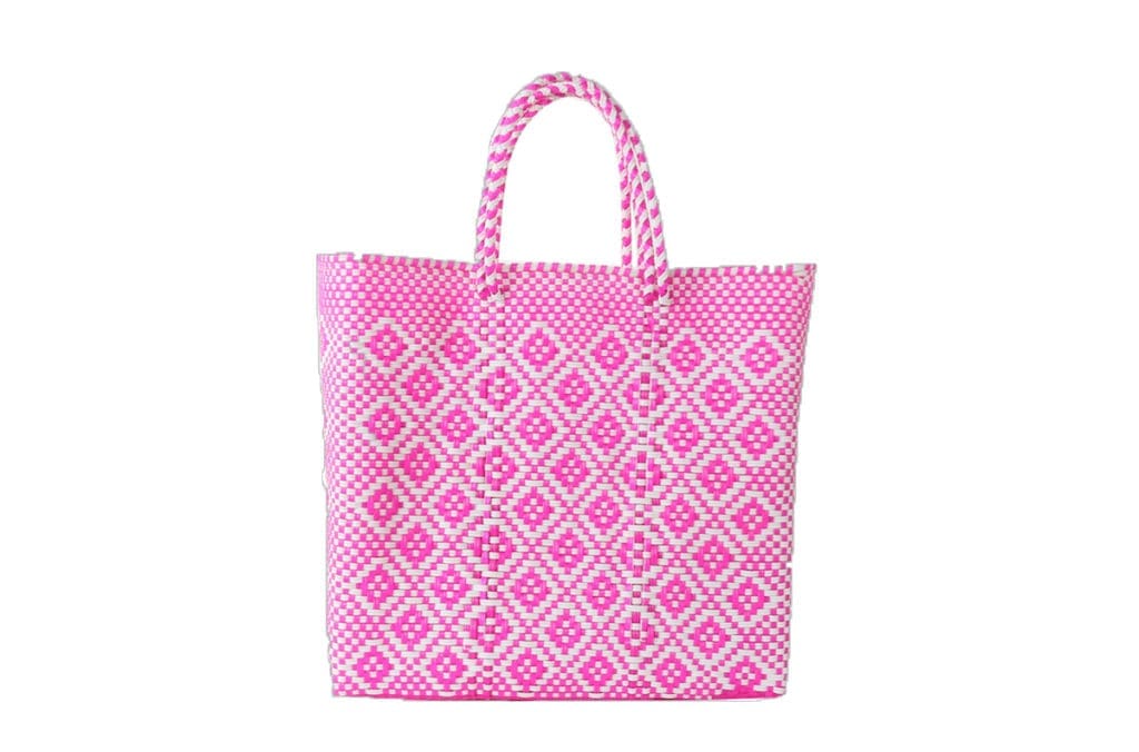 This waterproof, plastic woven bag, made by one of Mi Golondrina’s artisan community partners, is quite possibly the best beach tote in the game. It might even be the best tote in the game. We’ll stand by it.