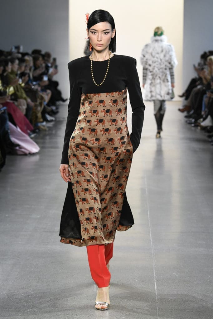 Bibhu Mohapatra rust organic silk block print Angarakhi tunic with red crepe cigarette pants. (Photo by Yannis Vlamos/Indigital.tv)