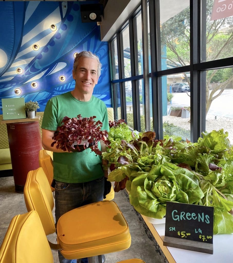 Local Foods' Benjy Levit in March with fresh produce straight from the farm to his pop up market. (Photo by Local Foods)