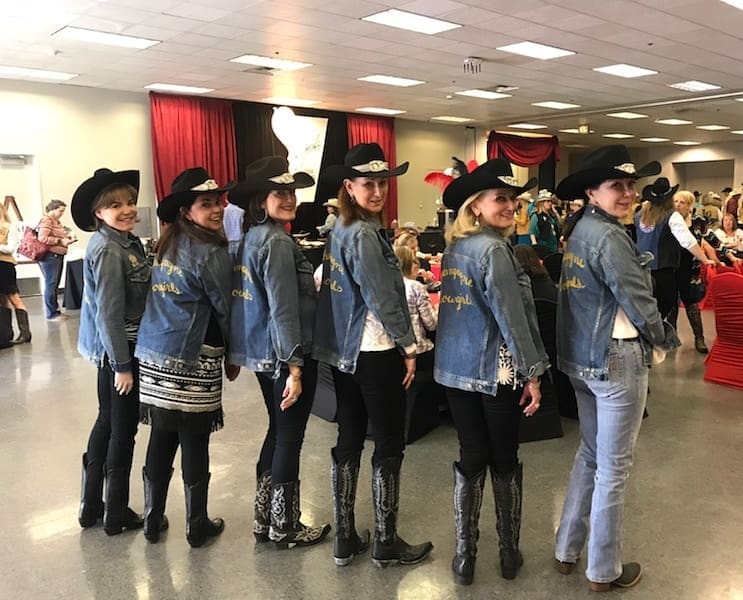 The Champagne Cowgirls showing off their team jackets in 2018.