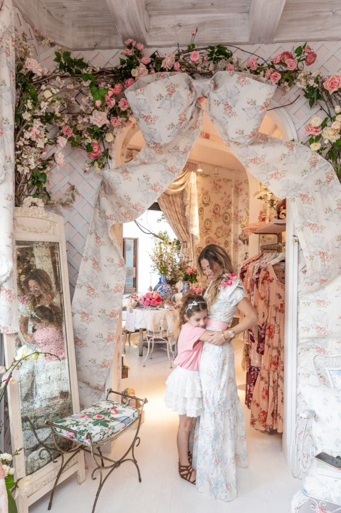 LoveShackFancy founder Rebecca Hessel Cohen and her daughter in the brand's Palm Beach store. 